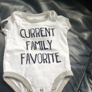 Baby onesie. “Current Family Favorite”